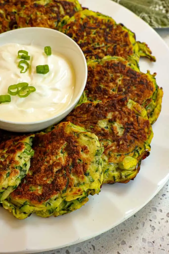 These Zucchini Fritters cook up crisp on the outside while tender, moist, and flavorful on the inside.