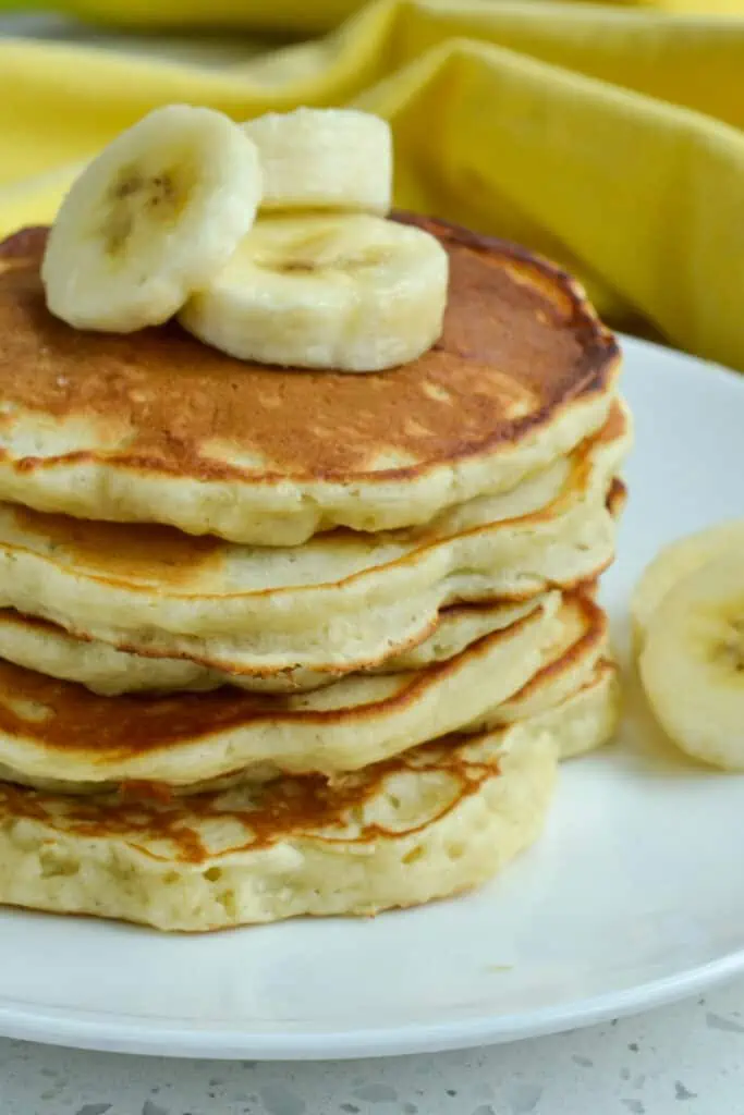 These light fluffy made from scratch buttermilk pancakes with all-natural banana flavor, vanilla, and a touch of cinnamon are hard to resist.