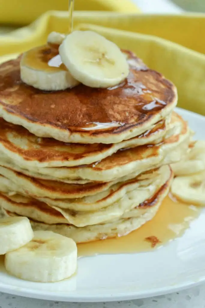 Get your banana fix with these homemade Banana Pancakes made with buttermilk, bananas, vanilla and a touch of cinnamon. 