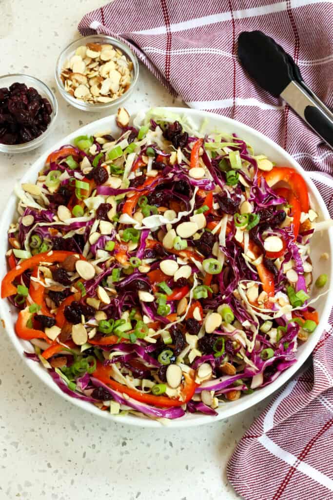 This beautiful cabbage salad is perfect for parties, potlucks, barbecues, and picnics. I love to serve it with grilled chicken, pulled pork, or barbecued ribs. 