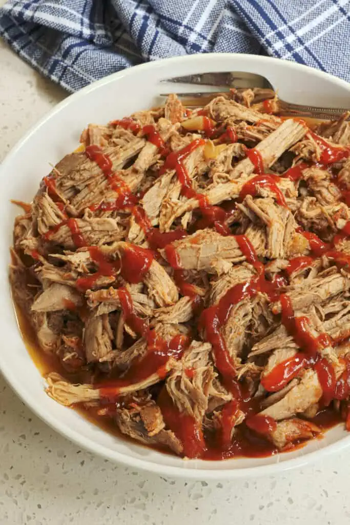 Drizzle the pork with my homemade barbecue sauce if serving as pulled pork sandwiches. 