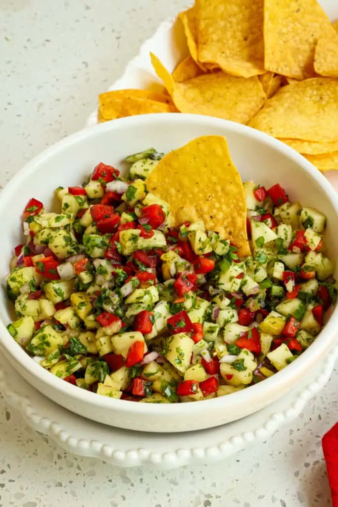 This easy pineapple salsa brings finely chopped fresh pineapple, red bell pepper, red onion, and jalapeno together with a little lemon juice and a generous helping of chopped cilantro.