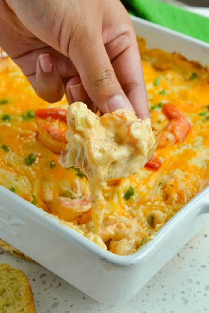 This mouthwatering good Shrimp Dip is creamy and cheesy with hints of smoky spice and big succulent pieces of shrimp.