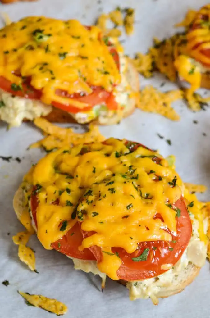 These open faced Tuna Melt sandwiches are a tasty combination of tuna salad, tomato and cheddar cheese toasted to perfection.
