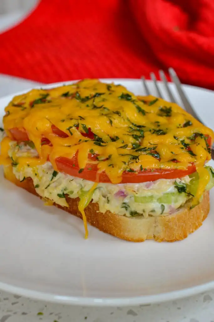 These family-friendly open-faced Tuna Melt sandwiches are a tasty combination of tuna salad, tomato, and cheddar cheese toasted to scrumptious perfection.