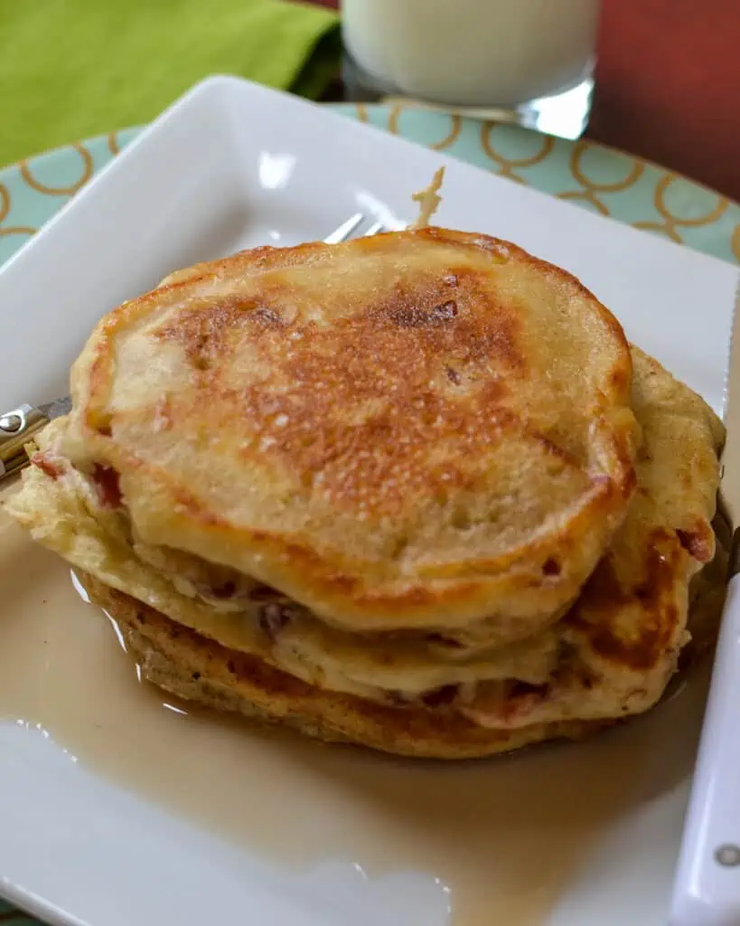 There is just something very comforting about buttermilk pancakes. Add bacon and cherry whiskey maple syrup, and you have yourself the king of comfort breakfasts! Just remember to serve them with a side of extra bacon and soft creamy butte