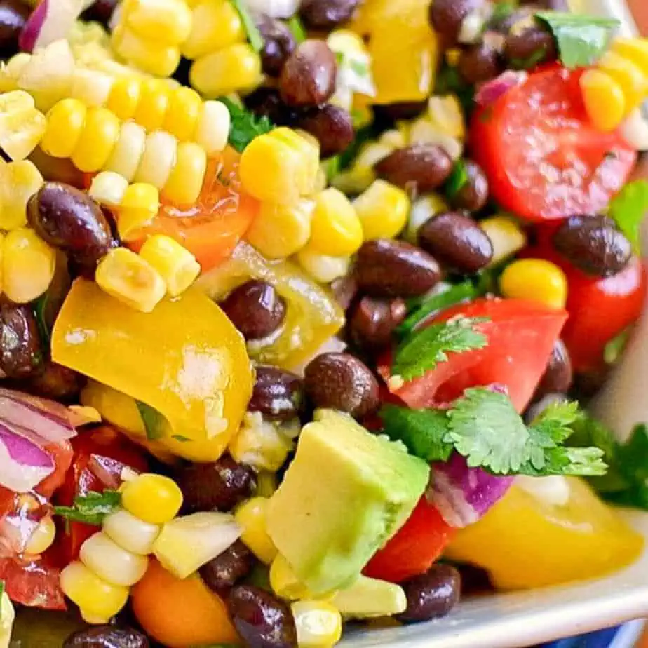 Fresh Black Bean and Corn Salad is a refreshing salad that's delicious on it's own, or served as a side with any Tex Mex inspired dish