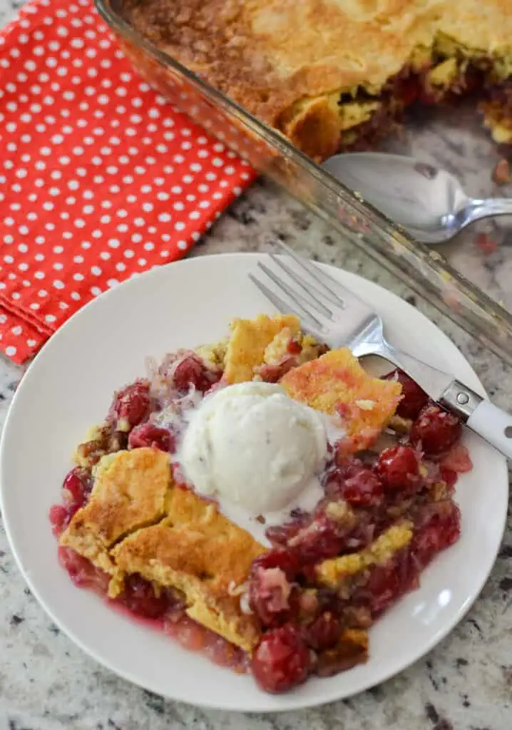 This family friendly scrumptious cherry dump cake has six easy ingredients comes together in less than ten minutes