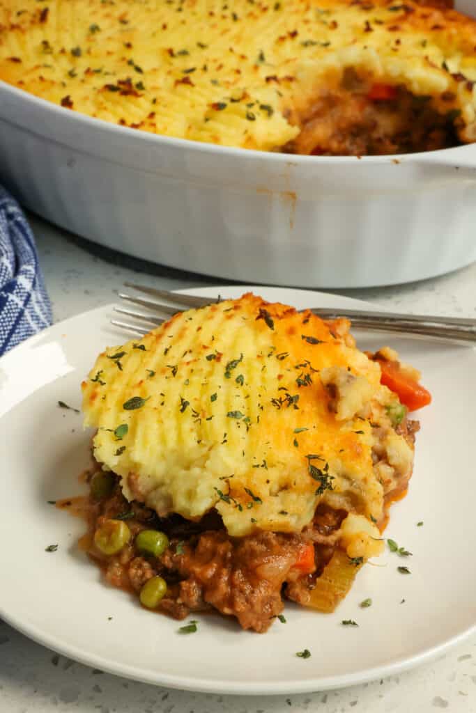 Sprinkle the top with chopped fresh thyme and bake for 25-30 minutes or until golden on top and bubbly on the edges. Let the dish cool for about 5 minutes before serving.