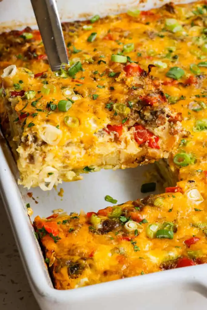 Get ready to impress your guest with this make-ahead, easily customizable breakfast casserole with all your favorites baked up with plenty of cheddar and hash brown potatoes in every bite. 