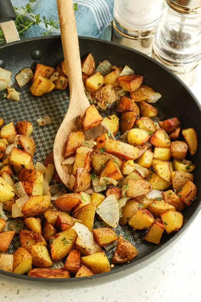 The best diner-style Home Fries recipe with crispy outsides and smooth and creamy insides seasoned perfectly with simple and tasty ingredients.