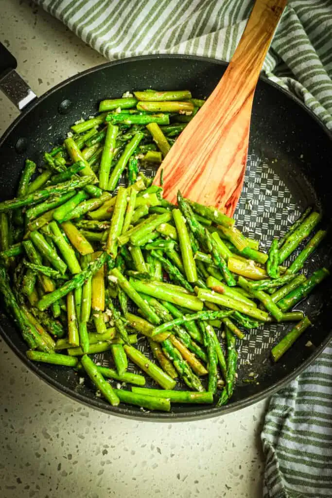 Easy Sauteed Asparagus with seven easy ingredients is the perfect side dish for baked fish, grilled chicken, or roasted pork.
