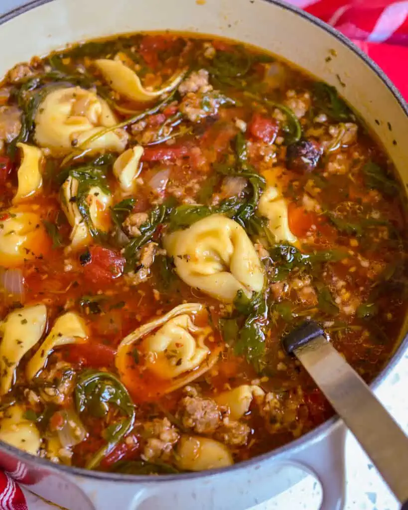 This Tortellini Soup is loaded with Italian Sausage, tomatoes, cheese tortellini, arugula and a blend of herbs and spices. 