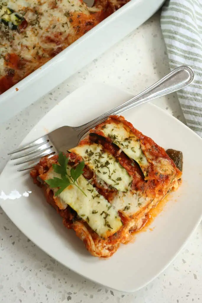 Zucchini Lasagna is a low-carbohydrate casserole that replaces the lasagna noodles with layers of zucchini noodles. A healthier alternative to classic lasagna, but with all the delicious, hearty flavor!