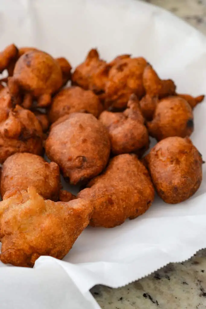 These Banana Fritters are family-friendly, super easy, crispy fried fritters full of fresh banana, cinnamon, cloves, and a pinch of allspice. 