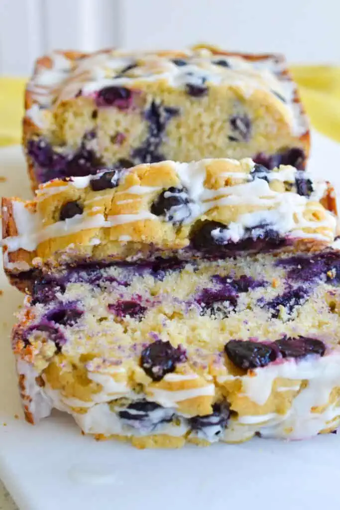 This sweet Blueberry Lemon Bread is filled with plump blueberries and topped with a zesty lemon icing. It's perfect for a light breakfast or as a sweet treat.