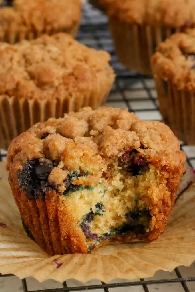 These blueberry muffins are slightly crunchy on the outside, tender and soft on the inside, and plump full of sweet juicy blueberries with a delectable sweet cinnamon crumb topping. 