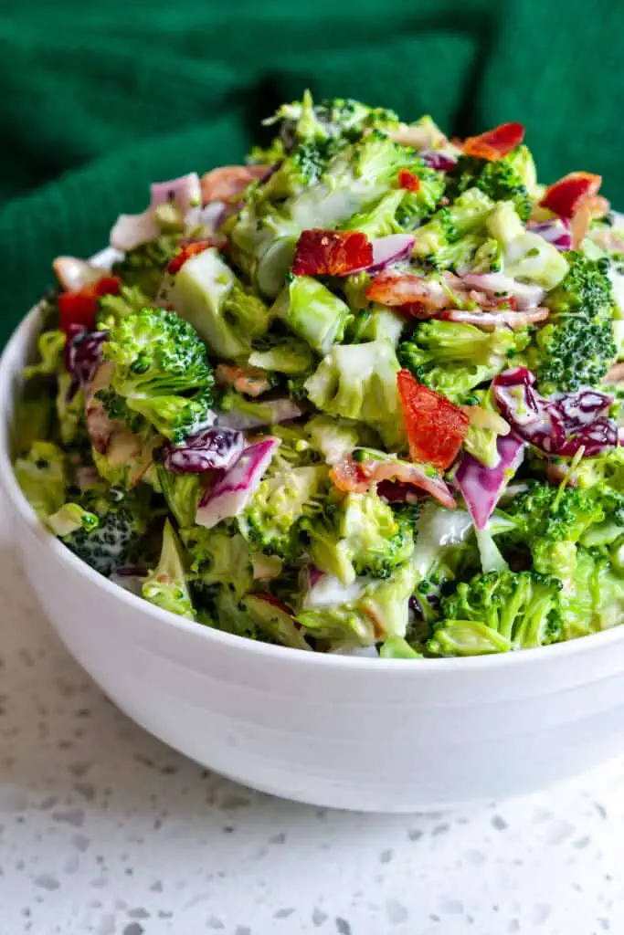 Broccoli Salad is one of my favorite go to summer recipes with fresh broccoli, smoked bacon, onion and sliced almonds. 