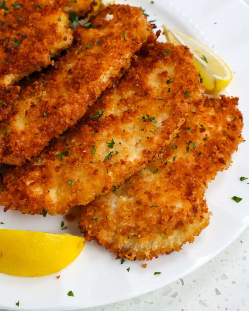 Chicken Schnitzel is a quick and easy dish that even a new cook can master.  I love to serve this with German Potato Salad, homemade spaetzle, or buttered egg noodles. 