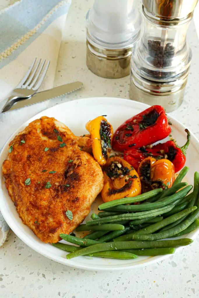 This quick and easy Pan Fried Chicken Breasts Recipe cooks up crispy with loads of flavor from cumin, paprika, onion powder, and garlic powder. 
