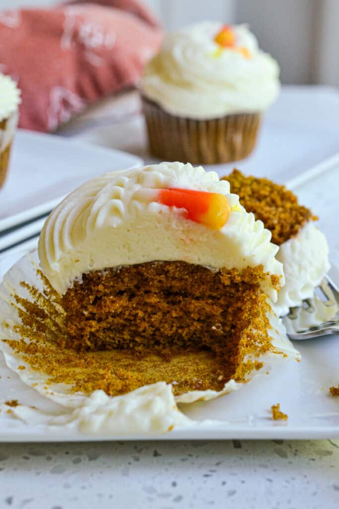 These easy-to-make pumpkin cupcakes are perfect for Fall. Made with real pumpkin and ground cinnamon, then topped with a whipped cream cheese icing. Make a batch of these scrumptious pumpkin cupcakes today!