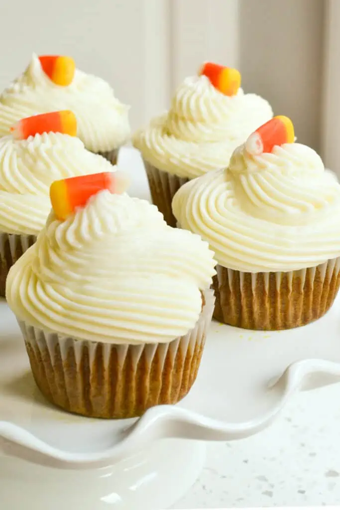 These easy-to-make pumpkin cupcakes are perfect for Fall. Made with real pumpkin and ground cinnamon, then topped with a whipped cream cheese icing. Make a batch of these scrumptious pumpkin cupcakes today!