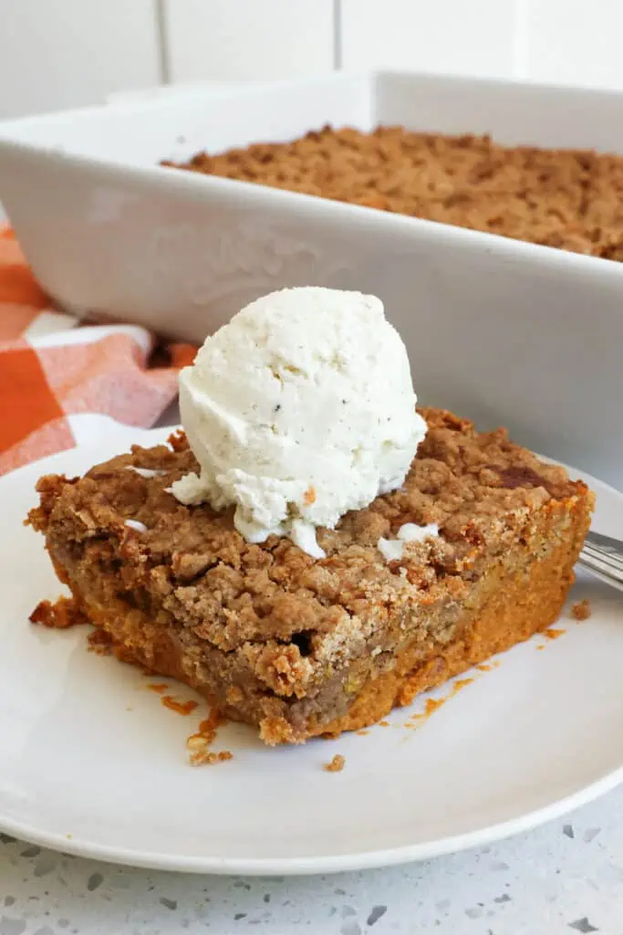 This pumpkin dump cake is so easy to make and so luscious with pumpkin pie filling and a sweet cinnamon crunchy topping.  It is the perfect fall dessert. 
