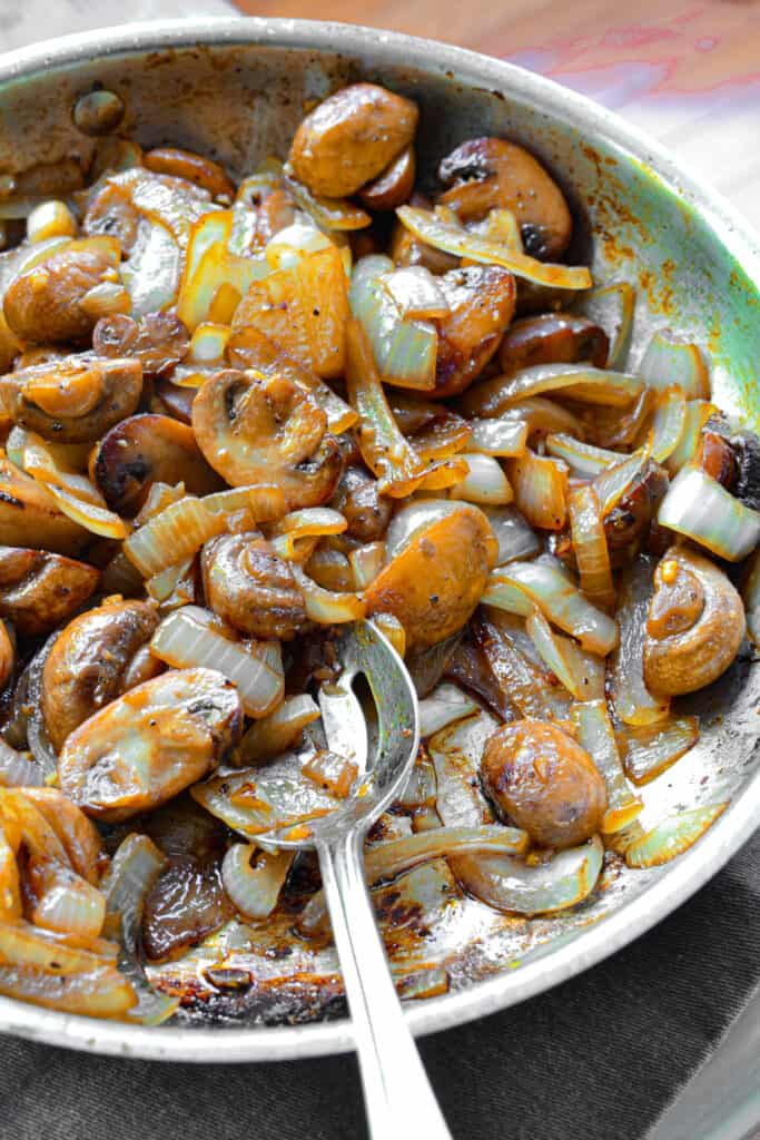 These deliciously easy Sauteed Mushrooms and Onions make the perfect side topping for grilled steak or a light dinner.  