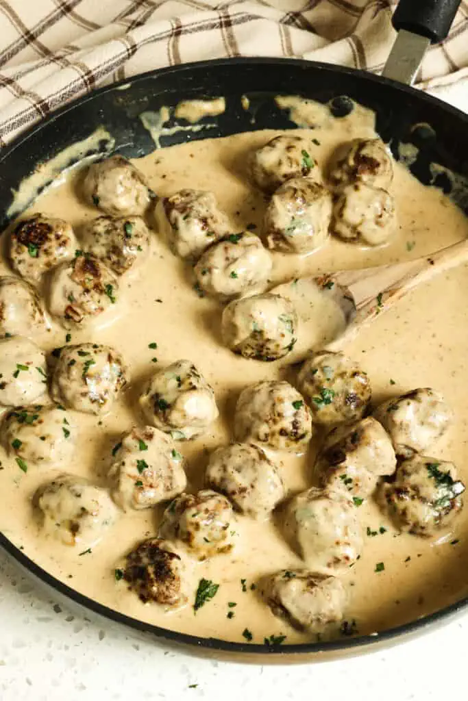 Swedish Meatballs are delicious tender beef meatballs in a hearty rich cream sauce with a hint of allspice and nutmeg