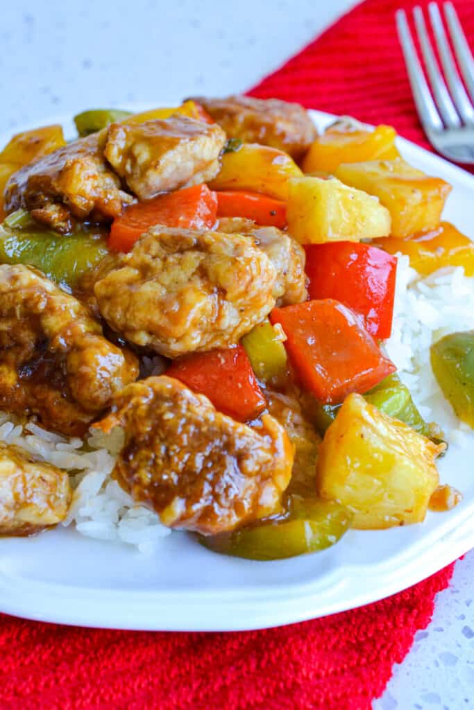 This Sweet and Sour Pork brings crispy pan-fried pork together with garlic, celery, sweet bell peppers, and pineapple in a slightly sweet, tangy Asian sauce.