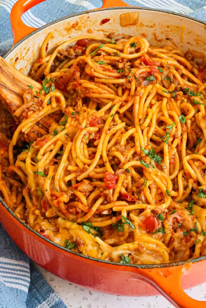 This quick and easy Taco Spaghetti is loaded with flavor from ground beef, onion, Rotel tomatoes, and taco seasoning.