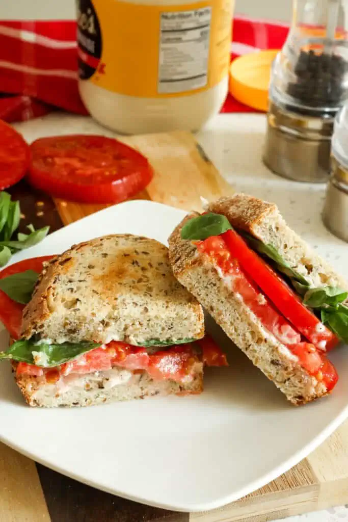 The best Tomato Sandwich ever made with simple ingredients in less than 5 minutes. This will quickly become your new favorite summer sandwich.