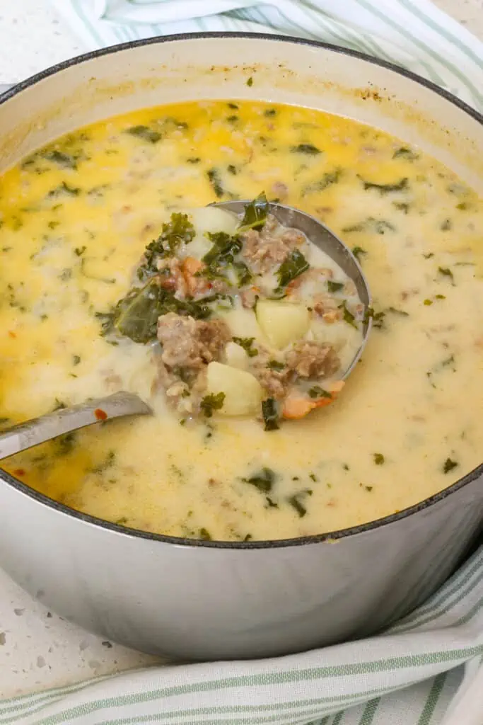 Zuppa Toscana is a tasty Tuscan Italian soup made with Italian sausage, onions, garlic, and kale. 