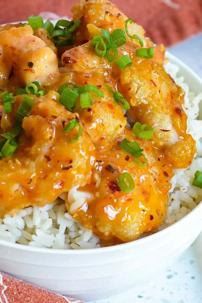 This easy Bang Bang Shrimp recipe brings crispy crunchy fried shrimp together in a spicy, sweet, and creamy chili sauce.