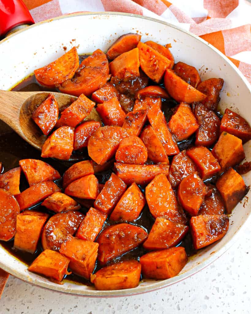 A skillet full of candied yams.