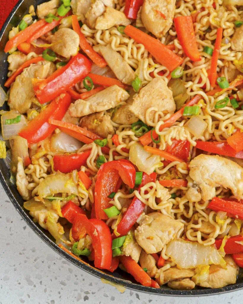 Chicken Yakisoba is a classic Japanese stir fry dish made with wheat noodles, crisp tender stir-fried vegetables, and browned chicken all in an easy-to-make mouthwatering sweet, and salty sauce. 