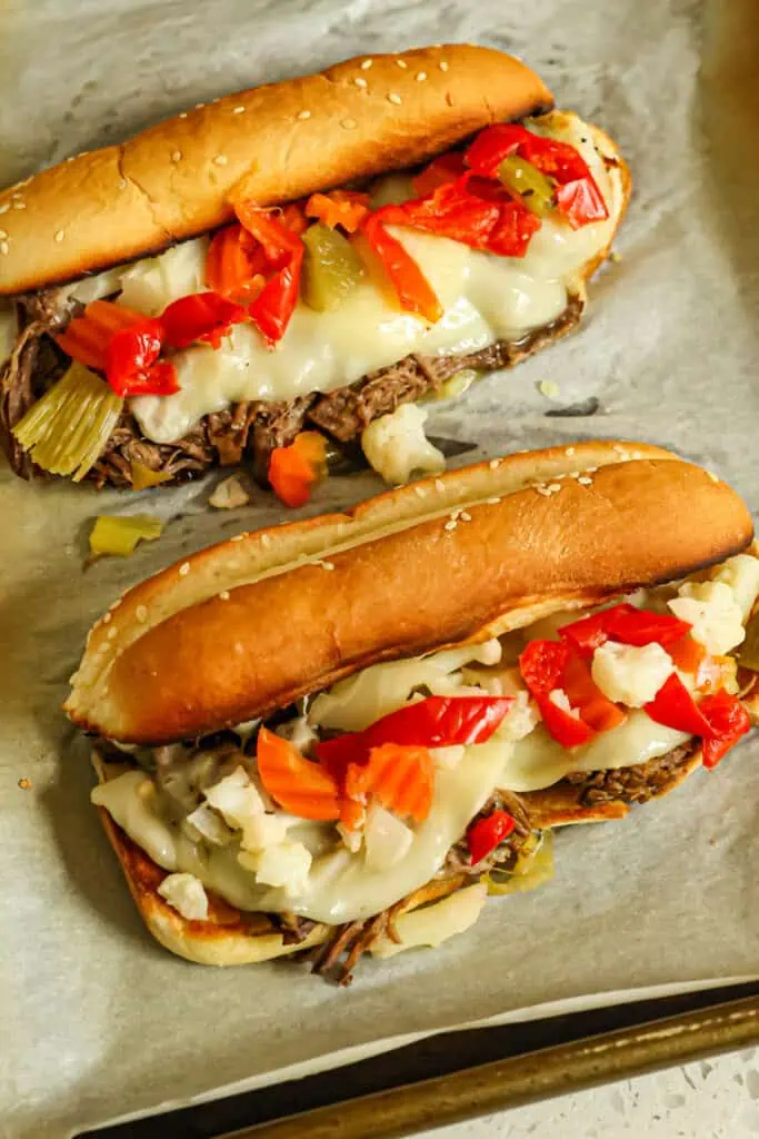  delicious mouthwatering sandwich loaded with fall-apart tender beef, pepperoncini peppers, melted provolone cheese, giardiniera, and dripping with au jus.  