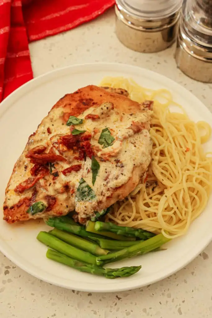 I love to serve this Marry Me Chicken over angel hair pasta with a side of sauteed asparagus. 