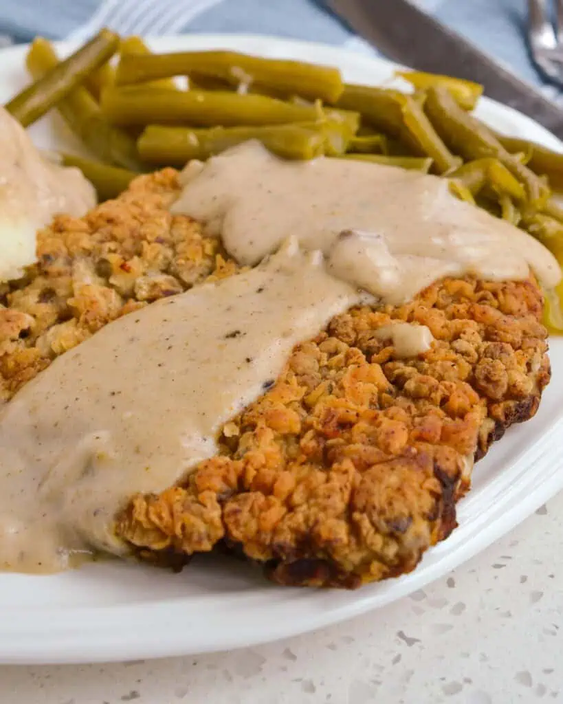 A close up view of chicken fried steak.