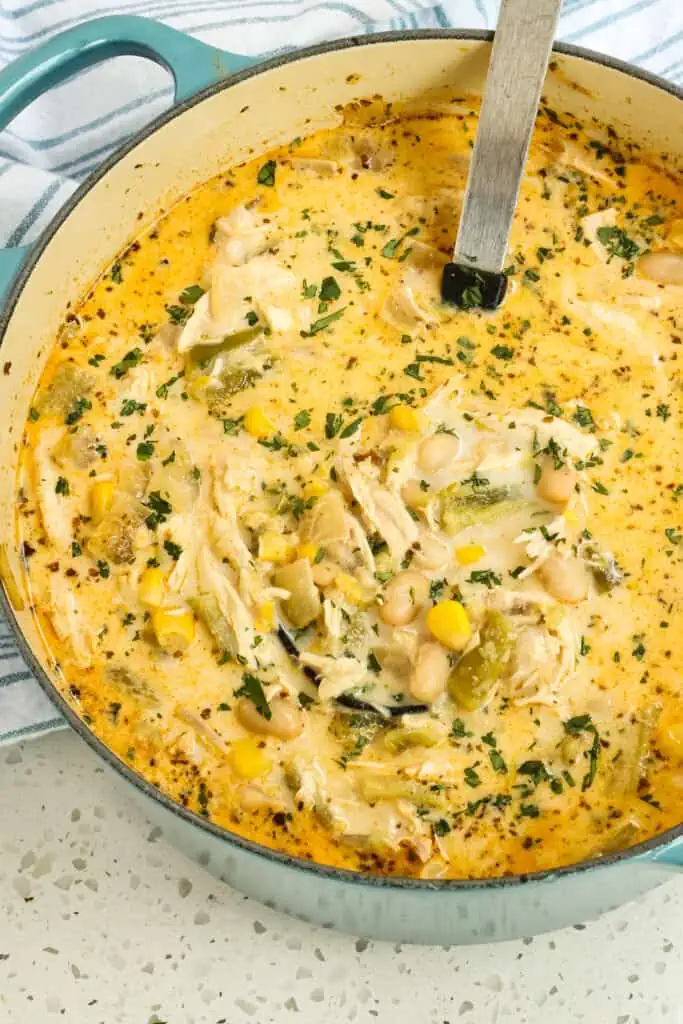 This White Chicken Chili combines Great Northern beans, rotisserie chicken, sweet corn, poblano and Anaheim peppers, onions, garlic and a perfect blend of spices into a wholesome soul warming chili.