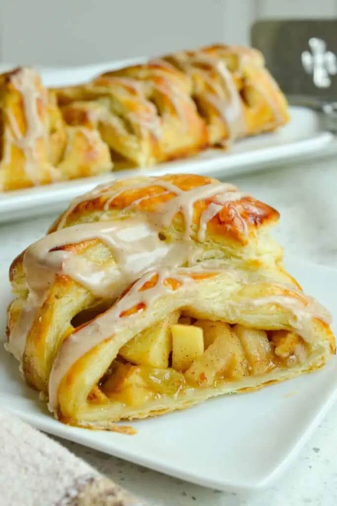 This Apple Strudel is made with ready made puff pastry, fresh apples, raisins, and an easy four ingredient cinnamon glaze. 