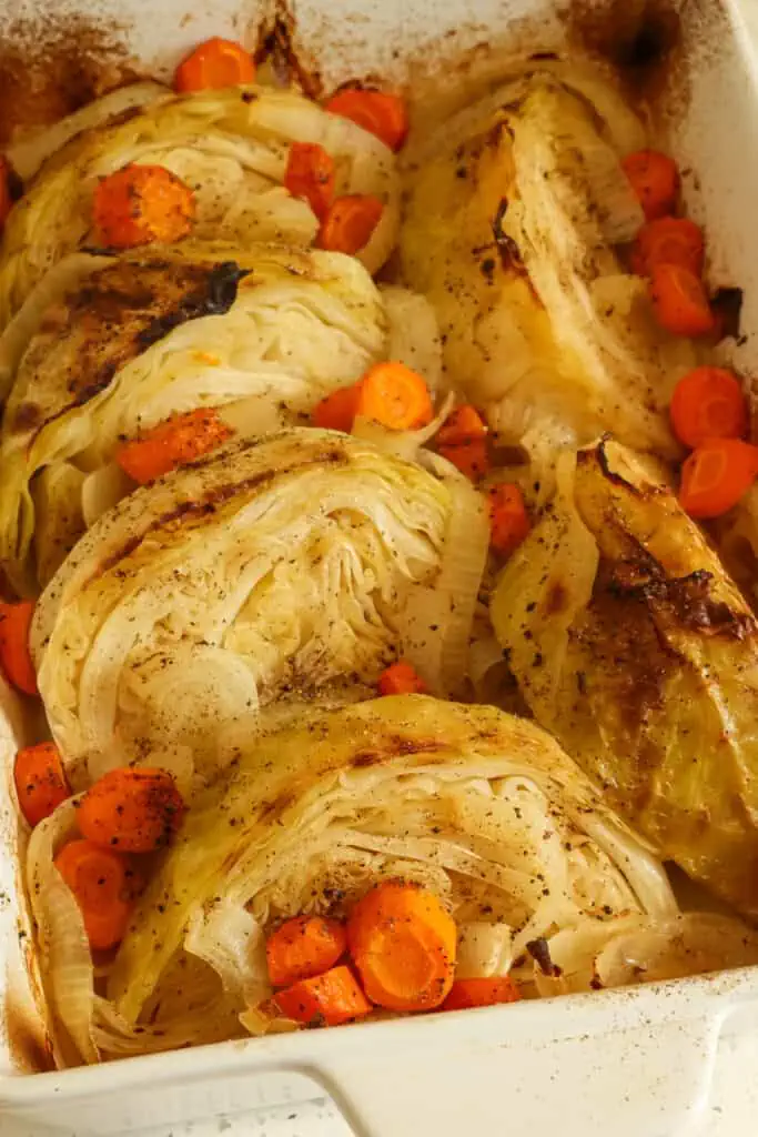 A deliciously easy Braised Cabbage Recipe with carrots and onions, seasoned simply with kosher salt and freshly ground black pepper, and a splash of vinegar for a little tang. 