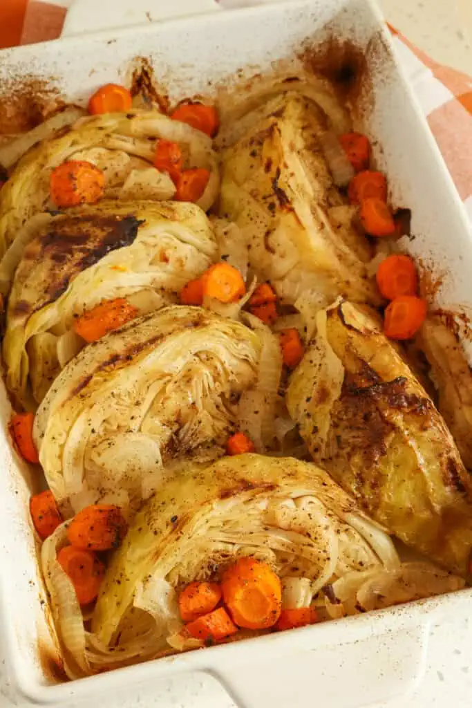 An easy oven Braised Cabbage Recipe with carrots, onions, and a splash of vinegar for just the right amount of tang.