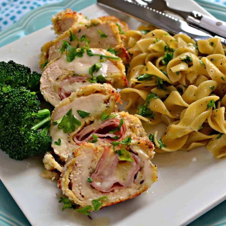 Crispy baked Chicken Cordon Bleu isPanko breaded chicken breasts stuffed with Swiss Cheese and ham on the inside and drizzled with a creamy Parmesan mustard sauce on top.