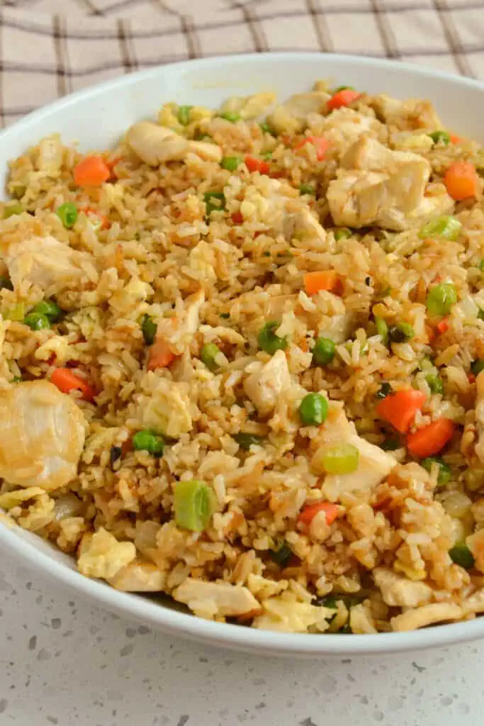Make this better than takeout Chicken Fried Rice right in your own kitchen.  With just a few simple tips, you can make this delectable recipe easily and quickly while controlling the amount of sodium
