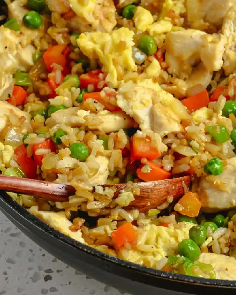 Make this better than takeout Chicken Fried Rice right in your own kitchen.  With just a few simple tips, you can make this delectable recipe easily and quickly while controlling the amount of sodium