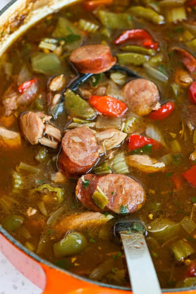 This gumbo starts out with a chocolate roux and ends with a touch of file powder, giving it that classic flavor-packed Cajun taste.