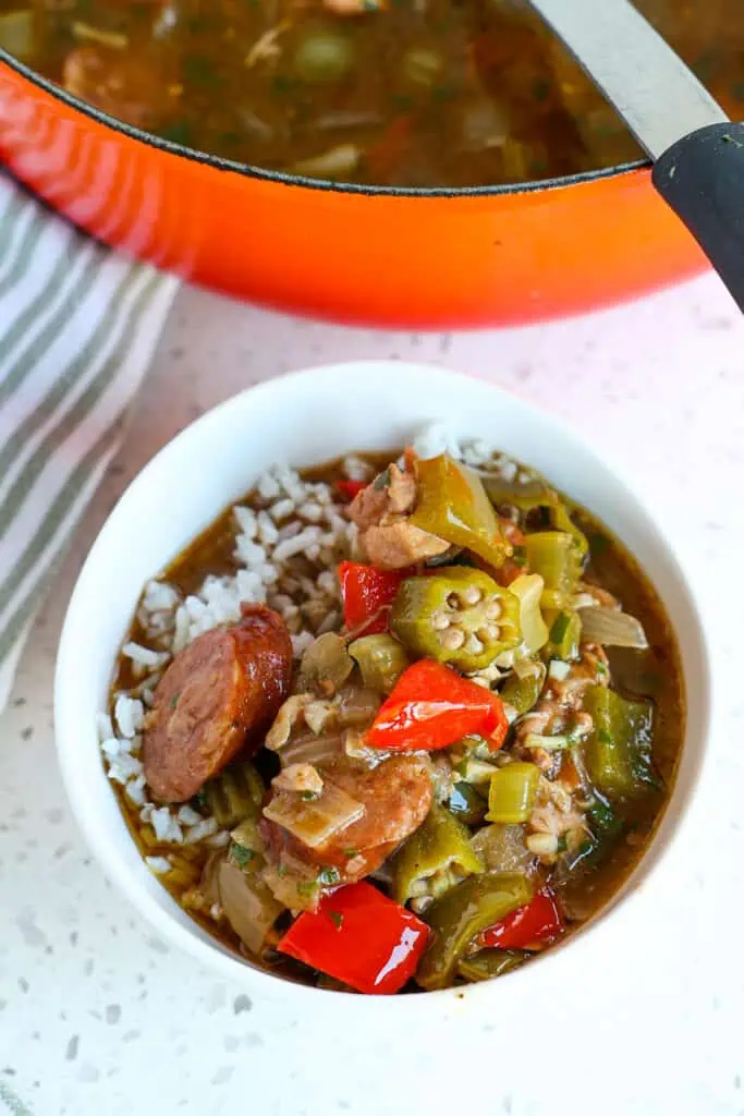 The best authentic New Orleans style dark gumbo with chicken, andouille sausage, onion, celery, bell pepper, and okra.