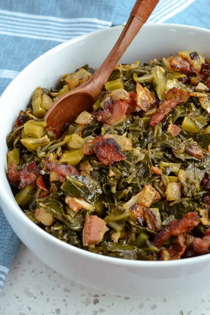 These southern-style Collard Greens are slow simmered greens with bacon, onion, garlic, and a perfect blend of seasonings to give it that down-home fresh off the farm southern touch. 