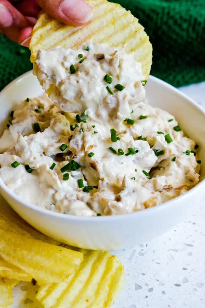 Calling all onion lovers.  This delicious and easy French Onion Dip with the sweetness of caramelized onions is the perfect chip dip for all your entertaining.  Serve with cut celery, cut carrots, sliced cucumbers, chips, crostini or pretzel sticks.  